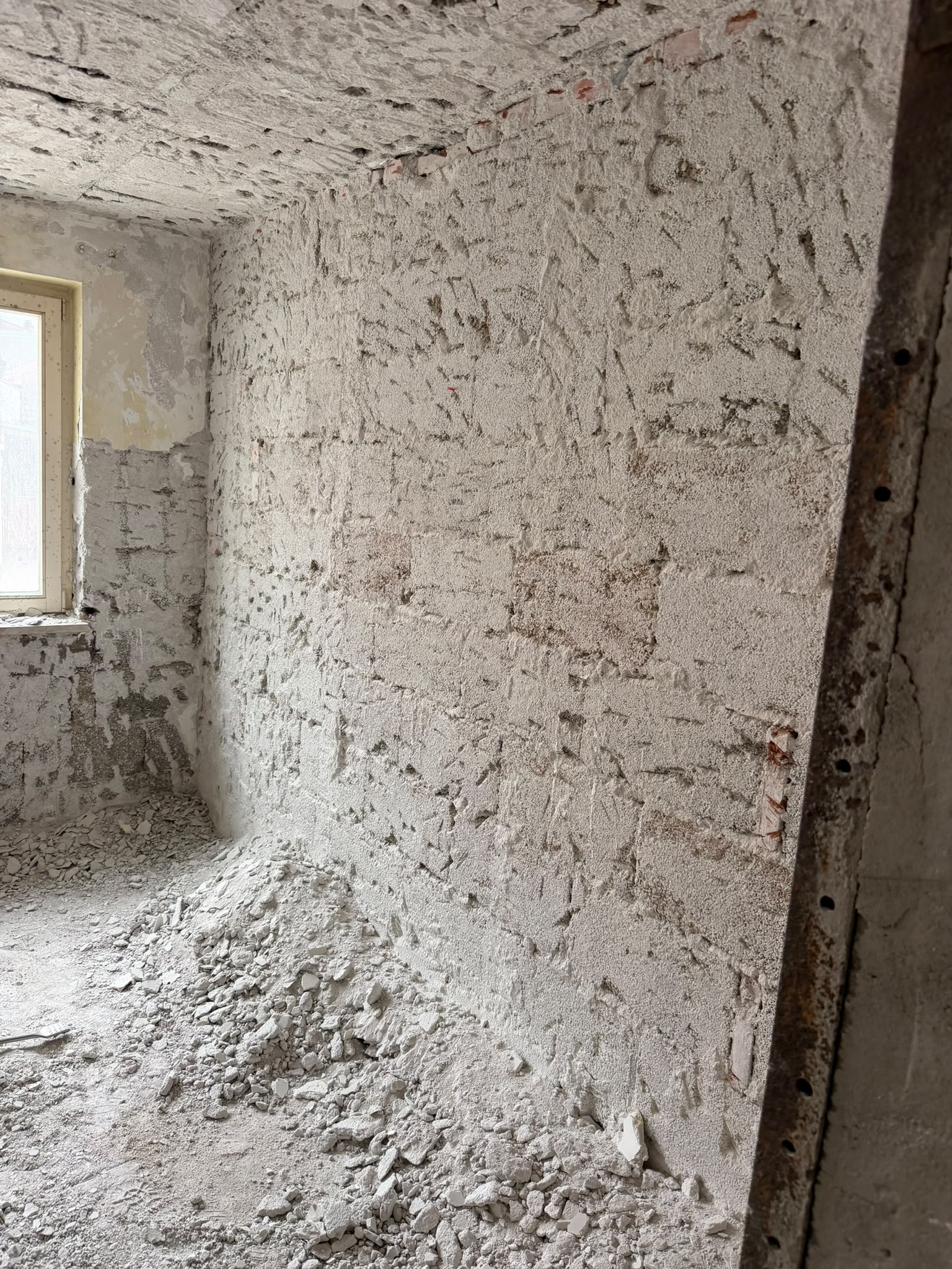 Untergrundvorbereitung und Spachtelarbeiten MFH Höchberg